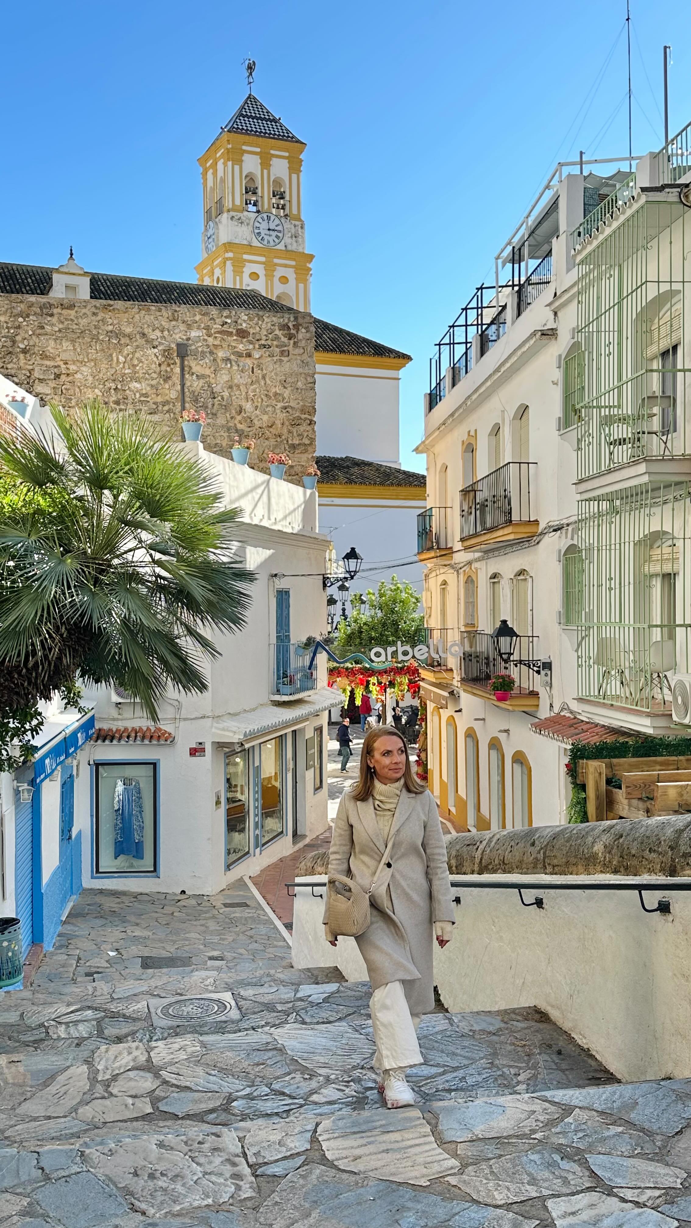 Marbella Old Town is full of little surprises for those who wander slowly. Narrow streets, colorful tiles decorating doorways and buildings, flowers spilling from windows, and small bars tucked away as if waiting to be discovered.
Every corner whispers stories from the past. The walls, the doorways, even the cobblestones hold layers of history — centuries of people, culture, and life layered throughout the city. Castillo Alcazaba, built in the 10th century during the Moorish period, stands as a reminder of Marbella’s rich heritage, overlooking the old town with quiet strength.
And after all that wandering, it’s impossible not to pause for a taste of the city. This time I stopped at a tapas and wine bar Barril del Gusto, savoring Chorizo de Ronda in almíbar de vino Cartojal with a glass of Spanish white wine. Simple, delicious, and perfect after a slow exploration. #spain #movetospain #malaga #marbella #travel