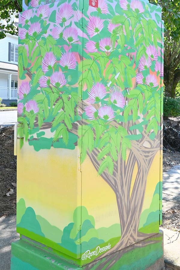tree-graffiti-painting-on-utility-boxes