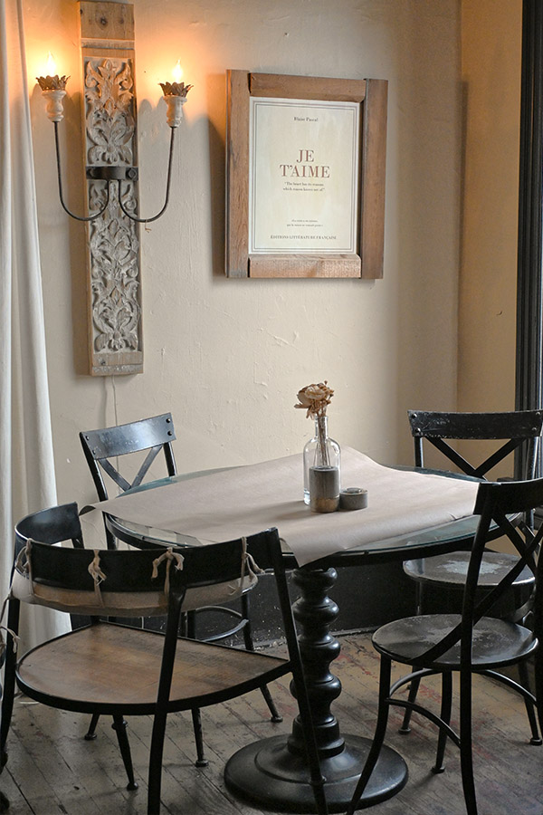 decorative-square-pillow-with-red-white-and-blue-stripes-and-the-text-FROM-THE-TOP-OF-THE-EIFFEL-TOWER-TO-THE-BASEMENT-OF-THE-ESCAR-GO-GO-PARIS-WAS-HERS-FOR-THE-TAKING