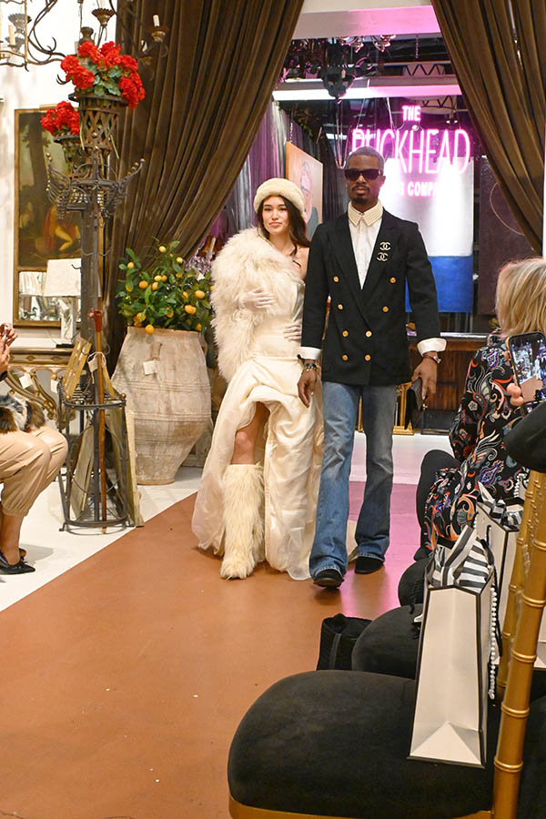 fashion-event-runway-man-chanel-blazer-woman-white-fur-outfit-the-brickhead-comp