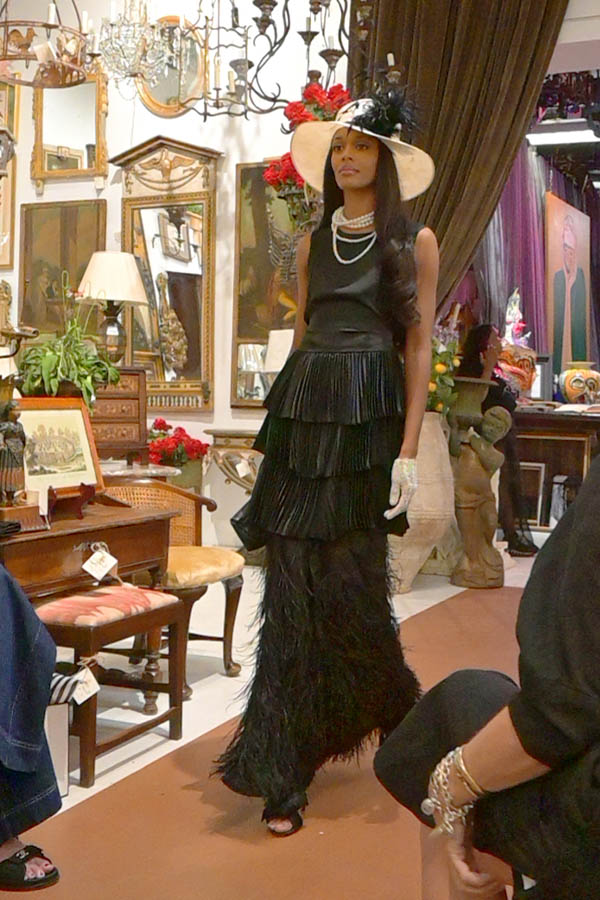 fashion-model-runway-black-tiered-feather-dress-white-gloves-hat