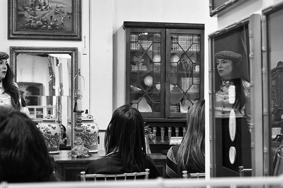 people-shopping-vintage-antiques-store-reflections-mirror-display-cases-atlanta