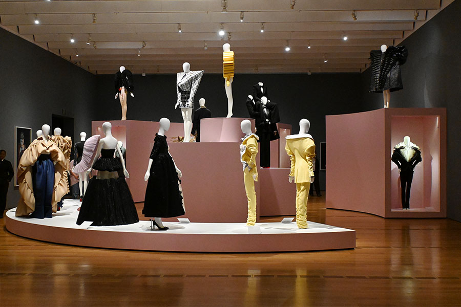 grand-finale-view-of-sculptural-fashion-masterpieces-on-tiered-gallery-podiums
