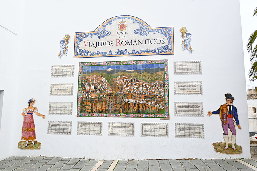 mural-made-of-ceramic-tiles-on-a-white-wall-dedicated-to-the-romantic-travelers-of-ronda-spain