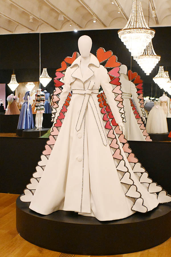 white-trench-coat-gown-with-cascading-heart-shaped-border-and-silver-glitter-trim