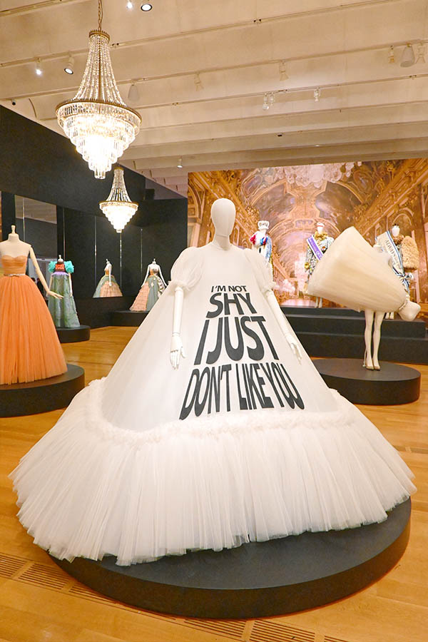 white-tulle-ball-gown-with-im-not-shy-i-just-dont-like-you-slogan-on-mannequin-viktor-rolf-collection