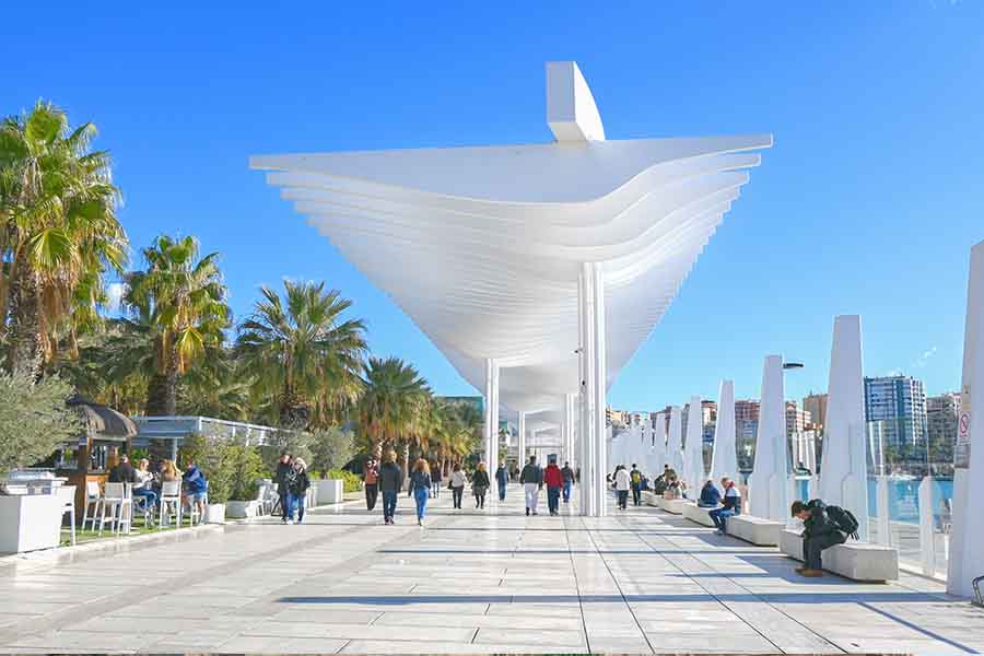 Modern-white-sculptural-canopy-over-a-sunny-pedestrian-promenade-Malaga