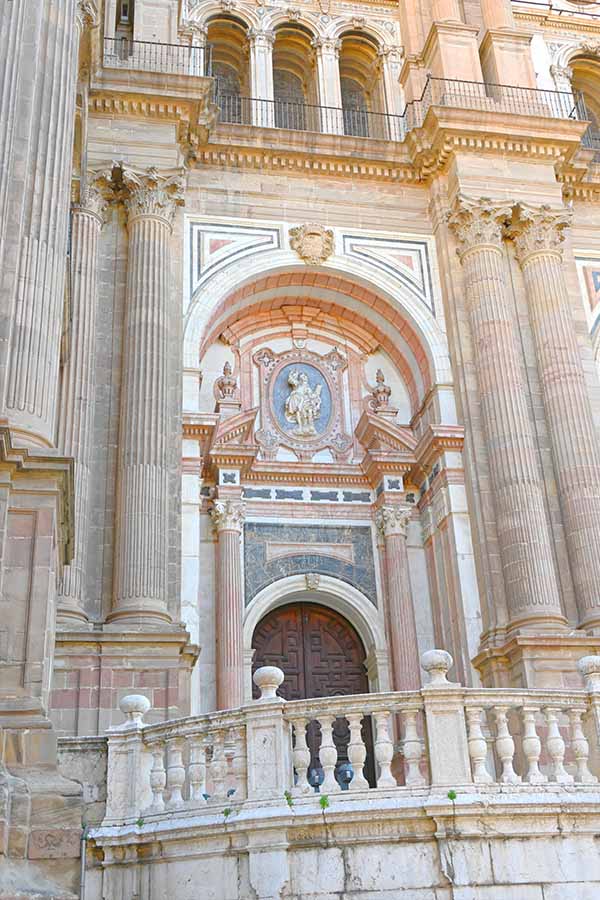 stone-cathedral-entrance-featuring-ornate-columns
