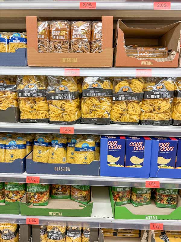 Assorted-pasta-packages-couscous-boxes-grocery-shelves