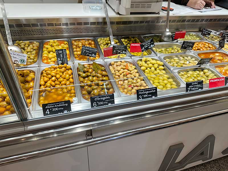 Stainless-steel-trays-filled-with-different-types-of-marinated-green