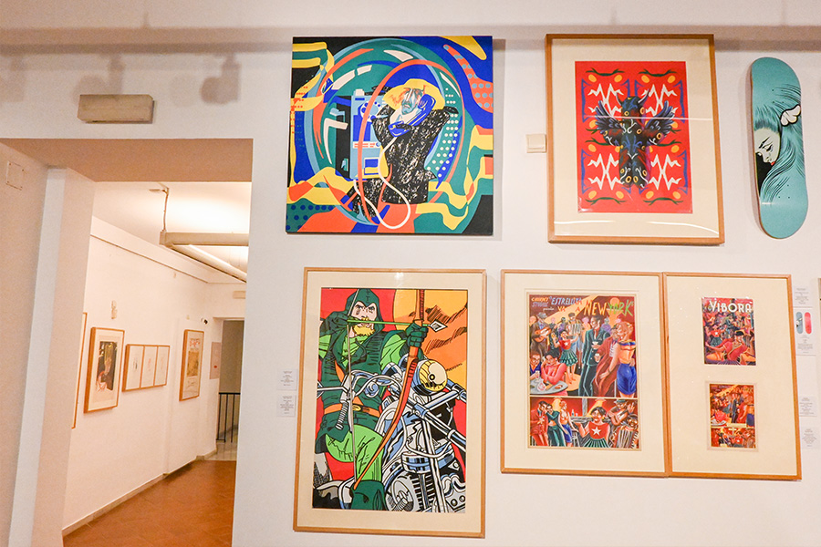 eclectic-gallery-wall-featuring-colorful-pop-art-comic-illustrations