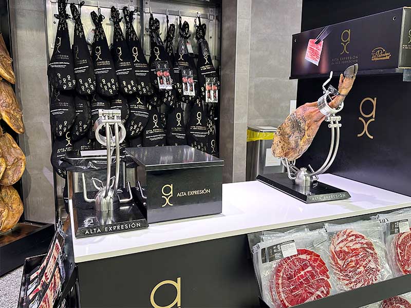 ham-station-with-cured-legs-hanging-and-pre-packaged