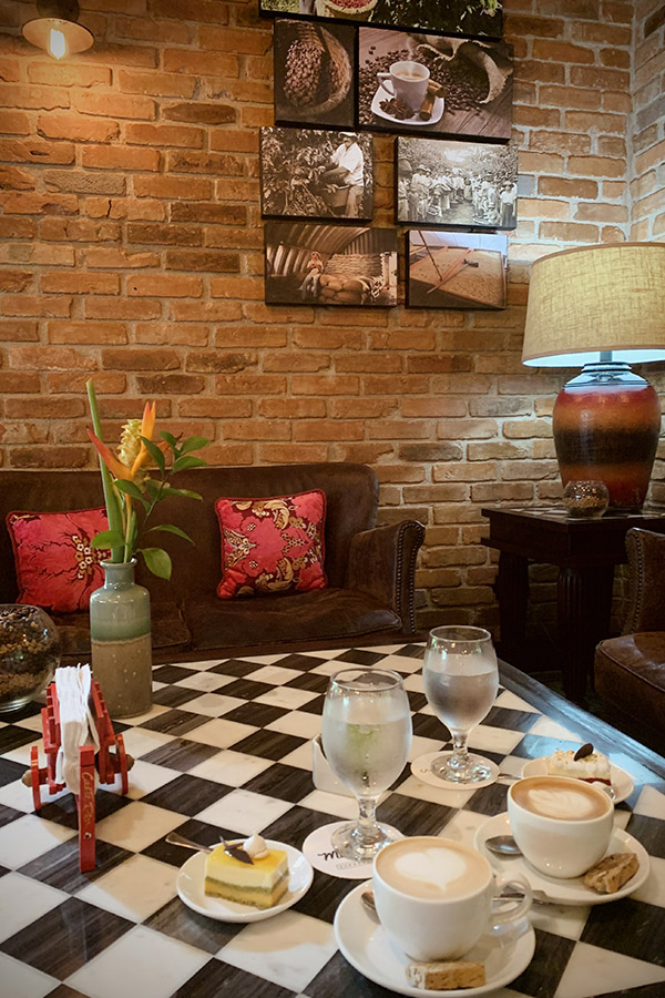 Cozy-cafe-interior-with-checkerboard-table-and-rich-Costa-Rica-coffee