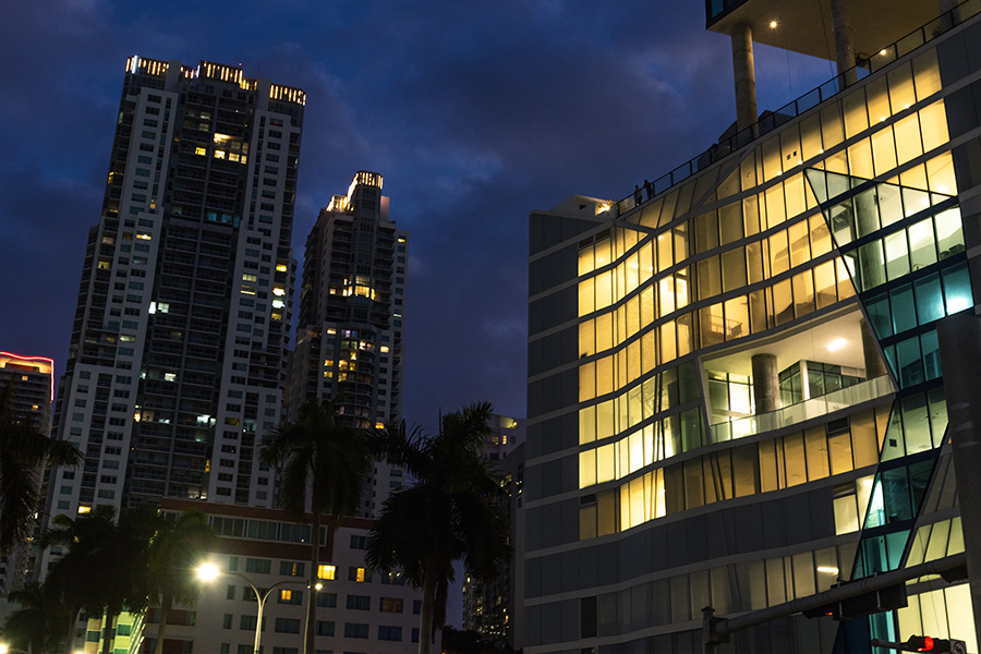 twilight-landscape-featuring-the-lit-windows-of-angular-modern-complexes-and-towers-in-Miami-Architecture