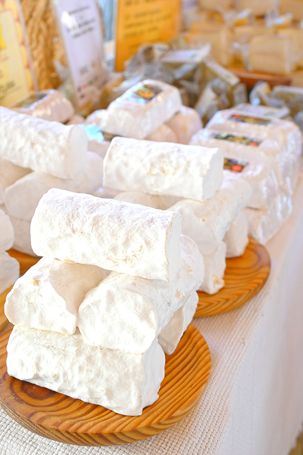 log-shaped-soft-goat-cheese-wheels-with-a-white-bloomy-rind