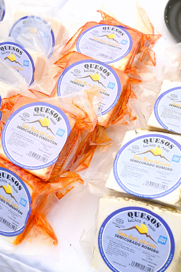 semicured-spanish-cheese-with-paprika-and-rosemary-at-the-cheese-market-in-coin-spain