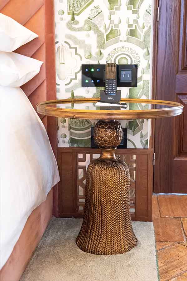 Bedside-table-brass-pedestal-tassel-base-wallpaper-hotel-claude-marbella-spain-interior-design-boutique-hotel-design