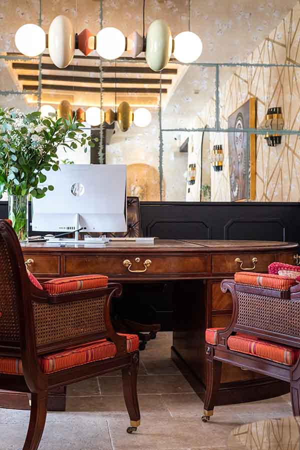 Reception-desk-wooden-chairs-modern-pendant-light-hotel-claude-marbella-spain-boutique-hotel-design-interior-design