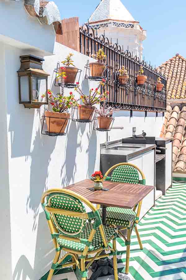 Rooftop-patio-potted-plants-green-chevron-tiles-hotel-claude-marbella-spain-boutique-hotel-design-interior-design
