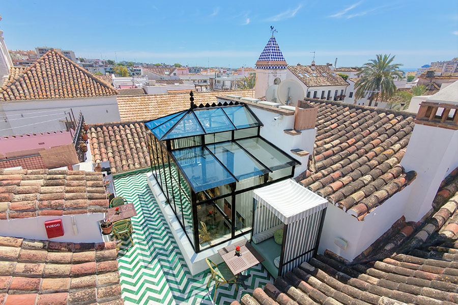 Rooftop-terrace-glass-solarium-green-patterned-tiles-hotel-claude-marbella-spain-boutique-hotel-design-interior-design