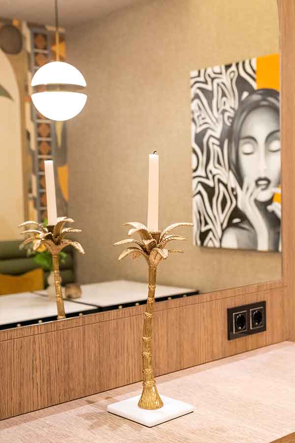Vanity-mirror-brass-palm-tree-candlestick-hotel-claude-marbella-spain-boutique-hotel-design-interior-design