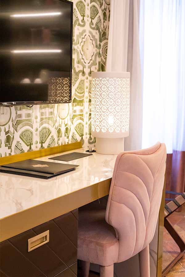 Writing-desk-pink-velvet-chair-white-patterned-table-lamp-hotel-claude-marbella-spain-interior-design-boutique-hotel-design