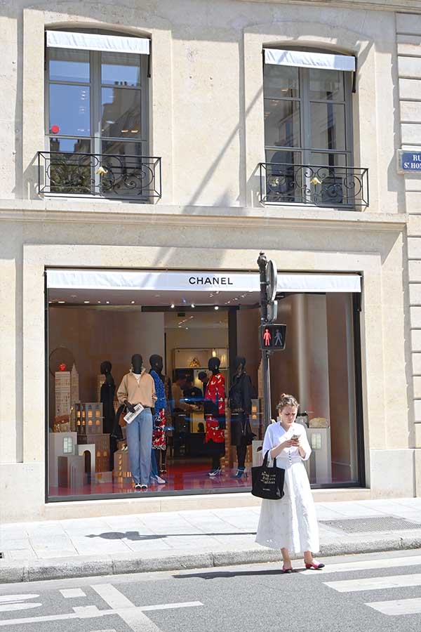 walking-near-chanel-store-paris-france