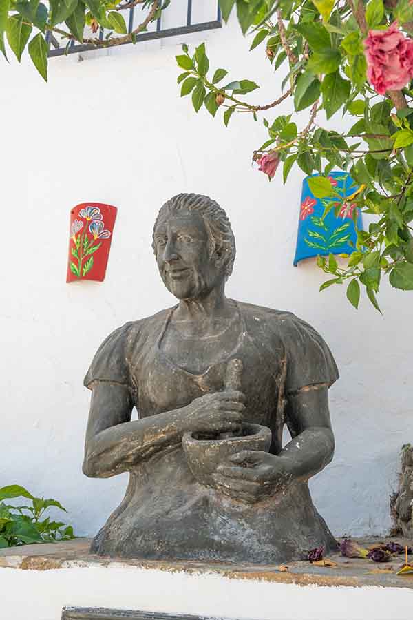 bronze-statue-woman-mortar-pestle-Almachar-Spain-white-villages-Andalusia