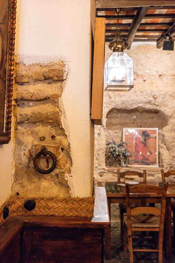 historic-stone-wall-interior-with-warm-lighting-for-historical-travel