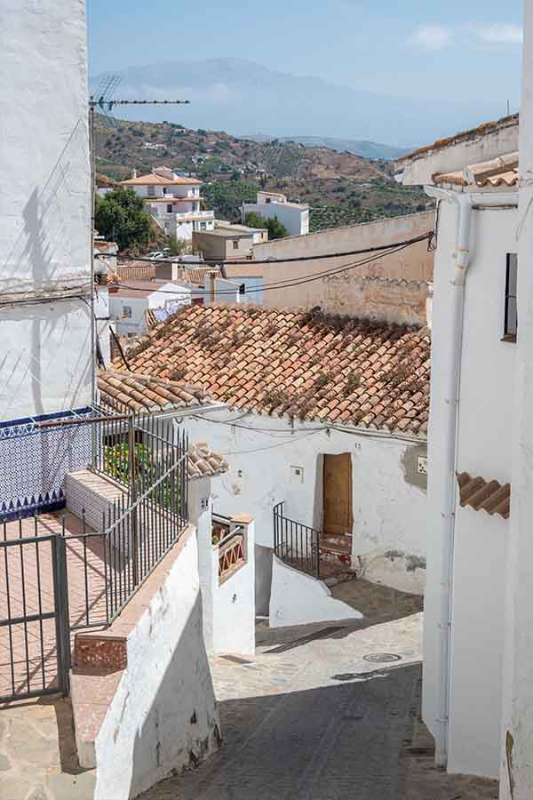 scenic-hillside-view-terracotta-roofs-Almachar-Spain-white-villages-Andalusia