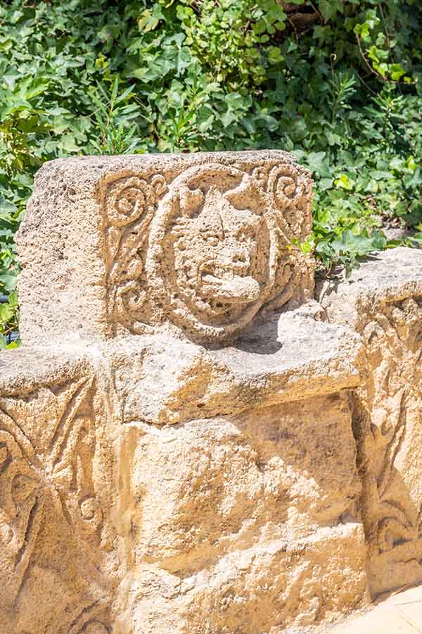 weathered-stone-sculpture-detail-perfect-for-historical-travel